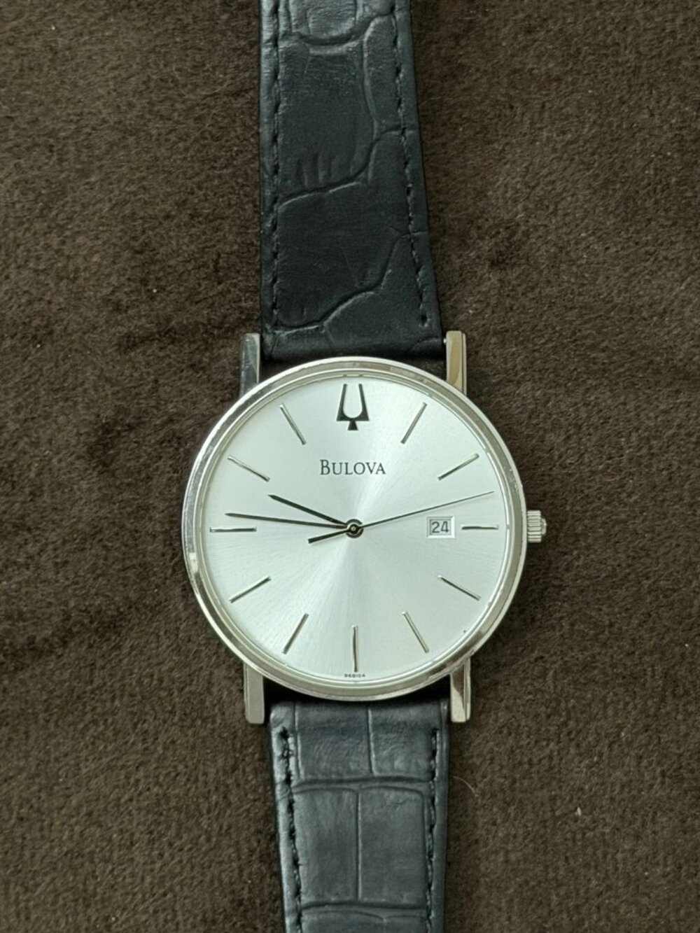 Bulova 96B104 Men's Quartz Analog Watch Silver Sunburst Dial Date Black Leather